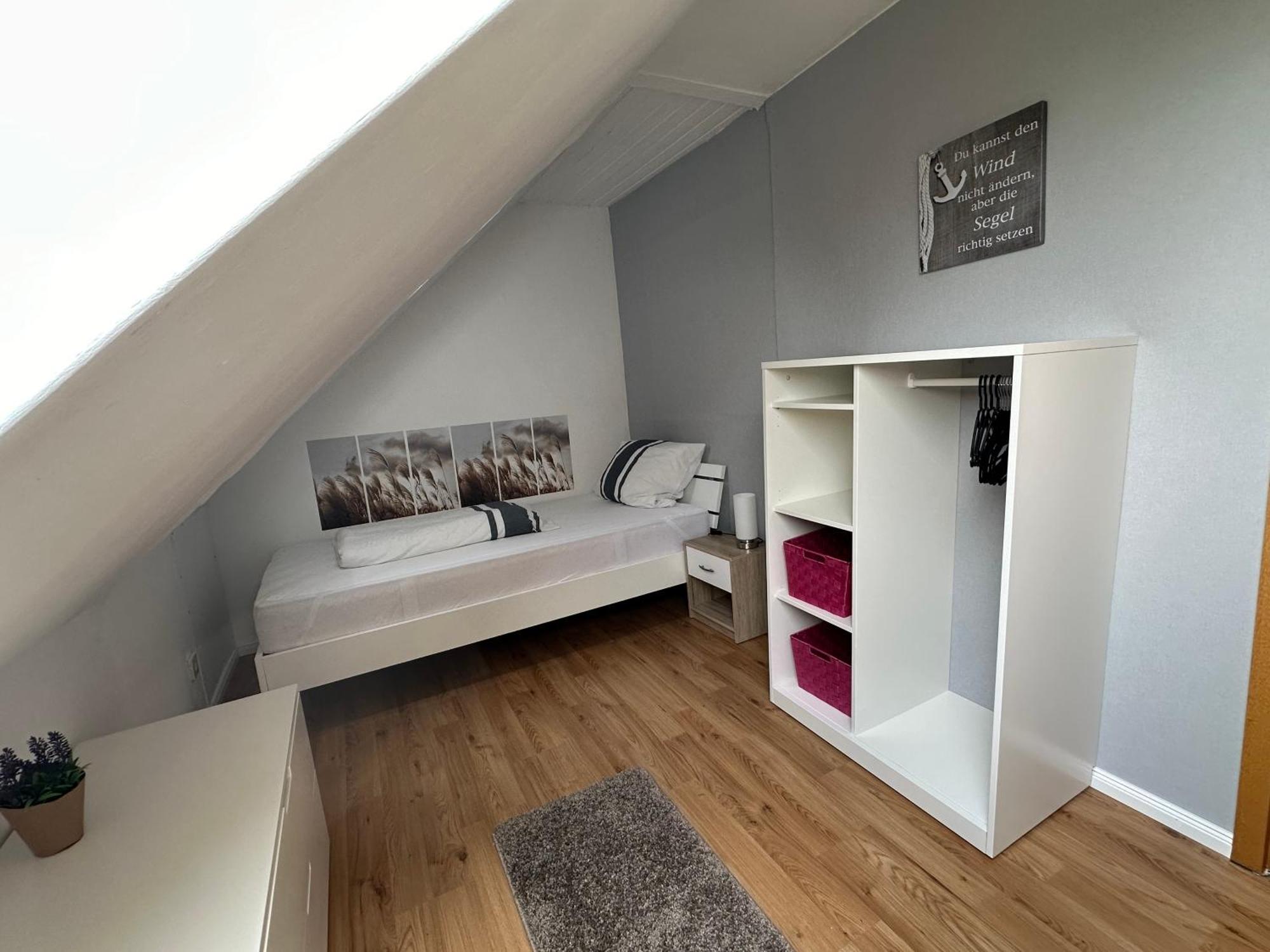 Rosenhaus Esens - Wohnung Backbord Exteriör bild